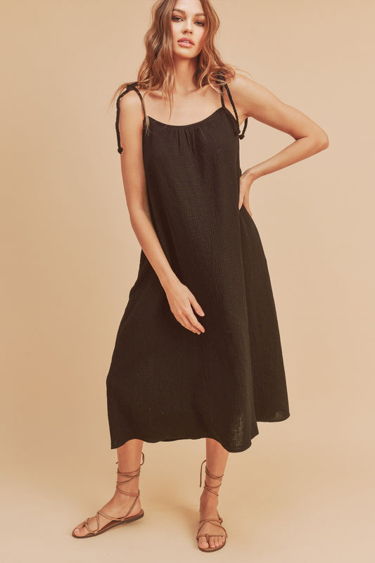 "Olivia Midi Cami Dress with Pockets – Chic, breathable cotton midi dress with a relaxed fit, functional pockets, and a stylish cami neckline."
